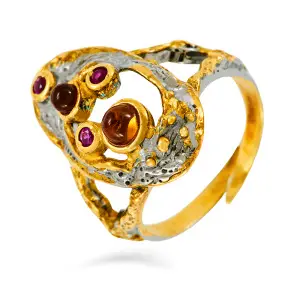 Серебряное кольцо черненое и позолоченное 925 пробы с фианитом